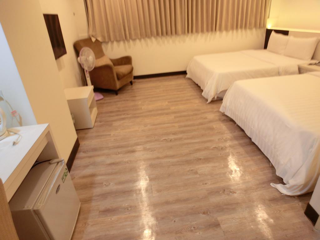 Lotus Yuan Business Hotel Zhongli Bagian luar foto