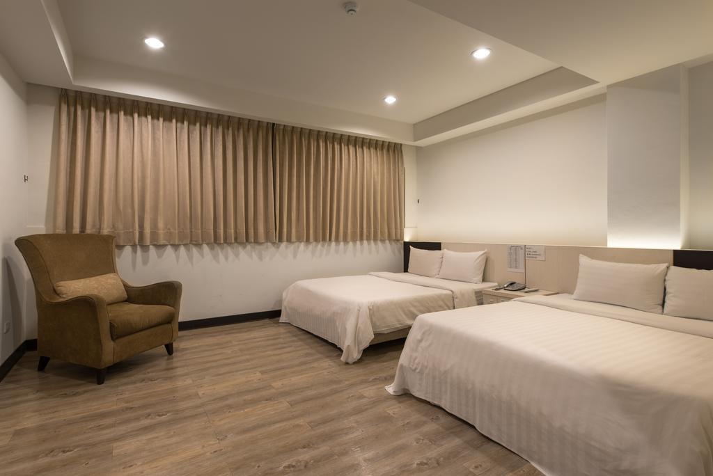 Lotus Yuan Business Hotel Zhongli Bagian luar foto