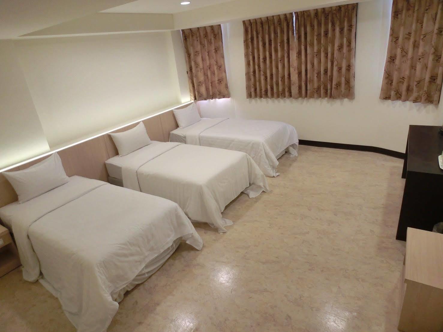 Lotus Yuan Business Hotel Zhongli Bagian luar foto