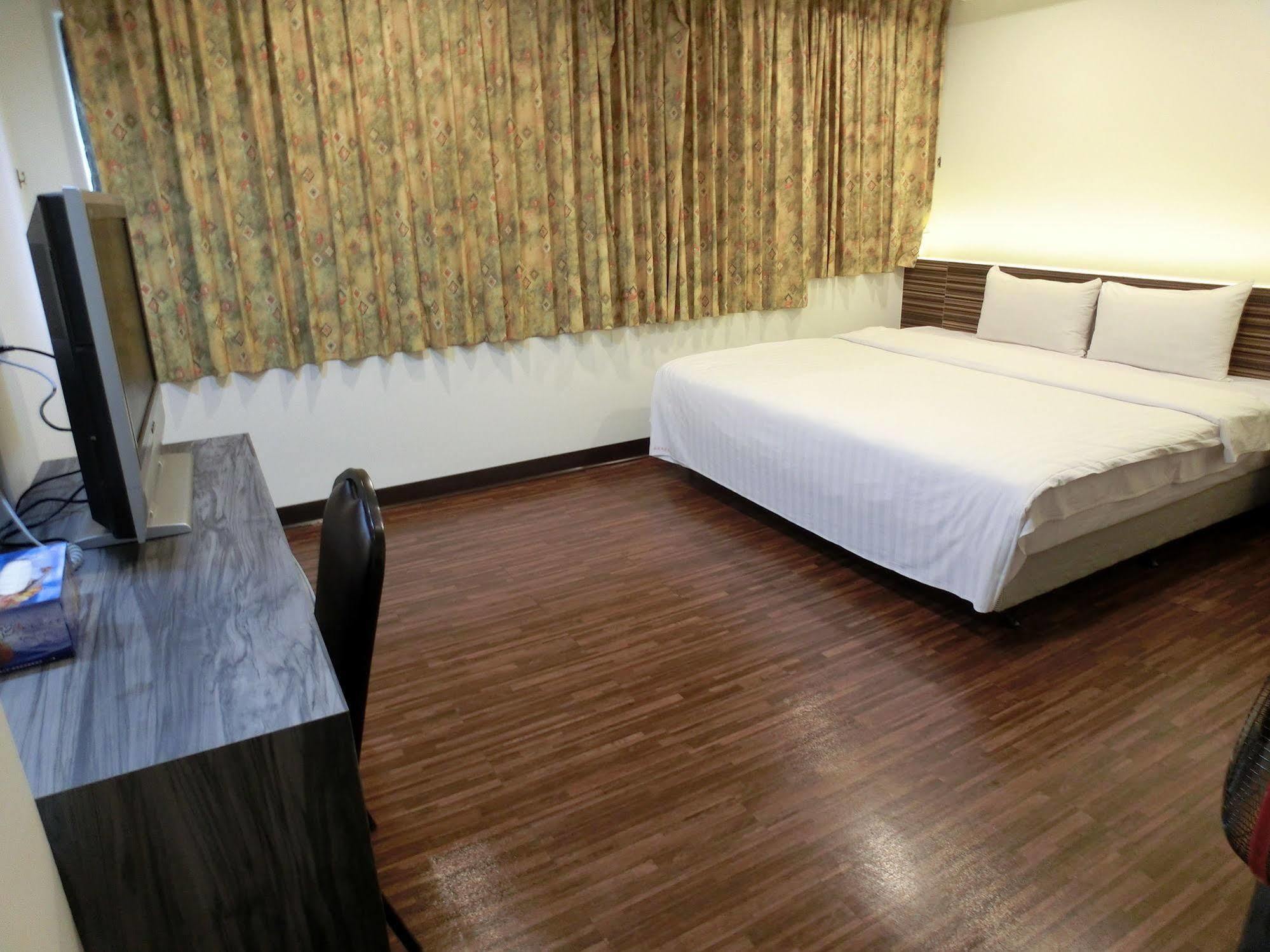 Lotus Yuan Business Hotel Zhongli Bagian luar foto