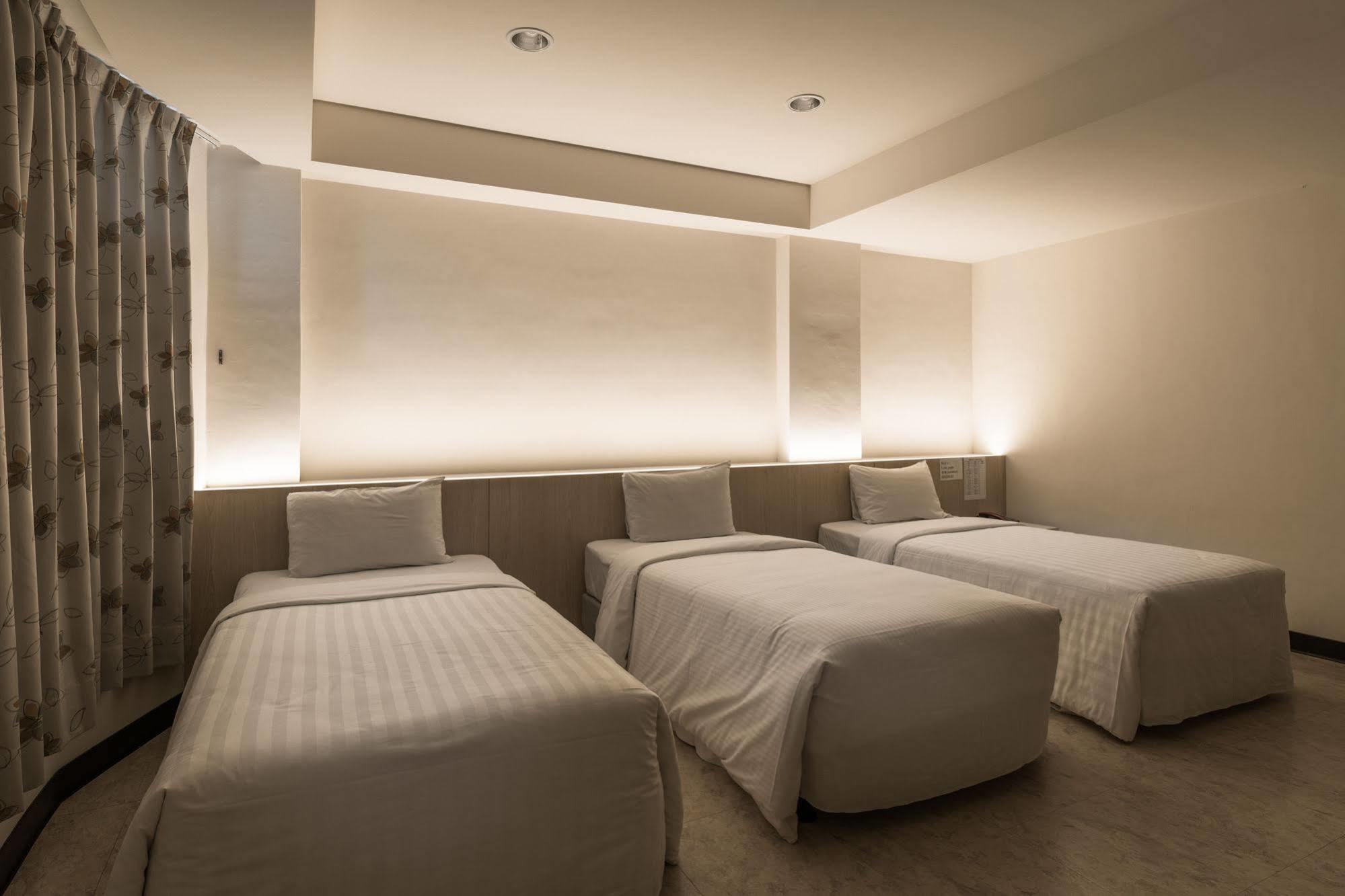 Lotus Yuan Business Hotel Zhongli Bagian luar foto